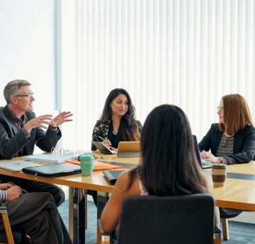 Staff meeting at table