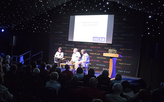 Prof Alan Llwyd, Dr Aled Eirug and Prof Mererid Hopwood on stage at Hay Festival