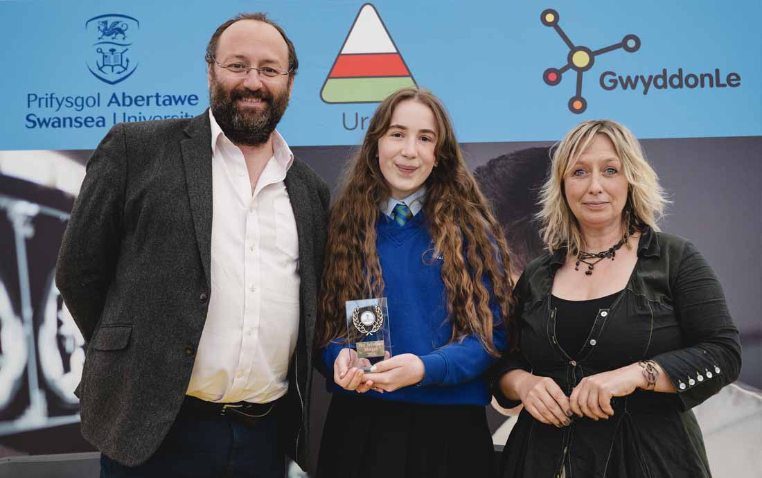 Esther Harper from Ysgol Gyfun Ystalyfera with Professor Trystan Watson and Heledd Sion