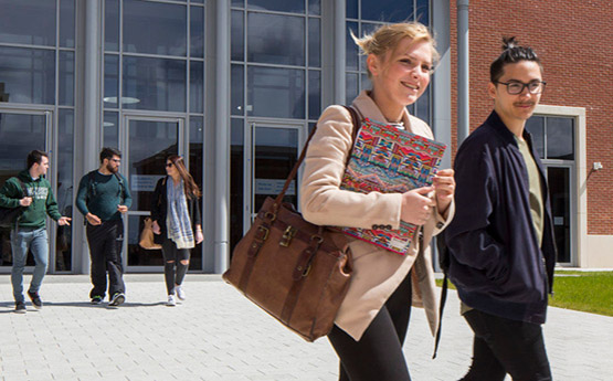 Students walking to a lecture on the Bay Campus