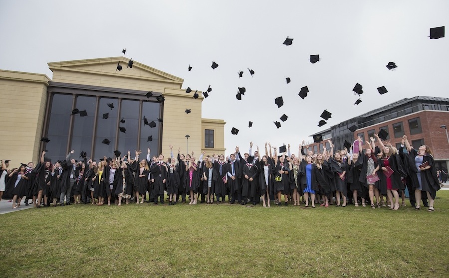 Crowd of graduates on the Bay Campus