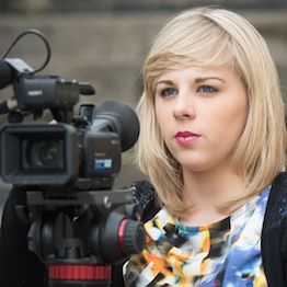 Student with a video camera