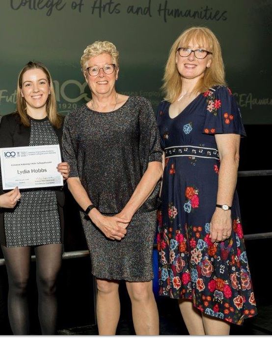 Lydia Hobbs receiving her award from Pro-Vice Chancellor Hilary Lappin-Scott