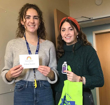 Two Freshers with their welcome packs