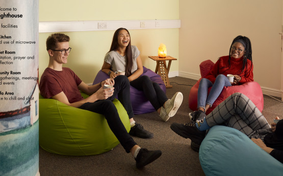 Students sat chatting on campus