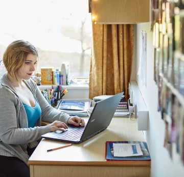 a student on a laptop 