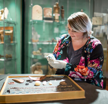 Person holding artifact