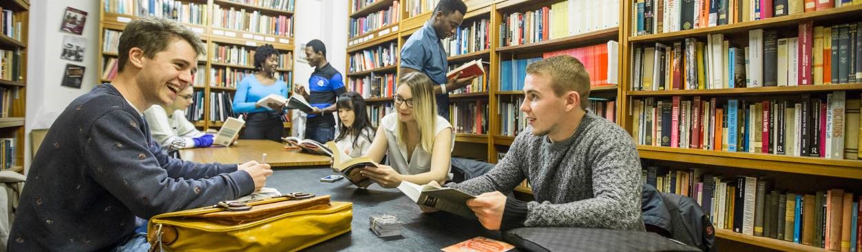 Researchers in a library 