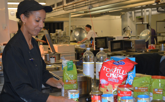 Women sorting food items