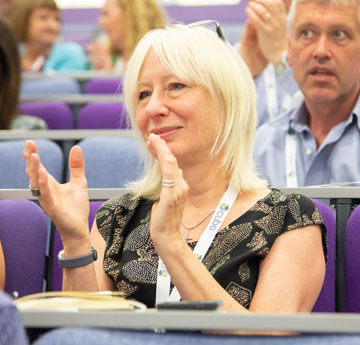 Woman in lecture theatre