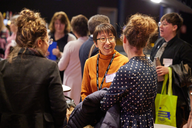 colleagues chatting at an event