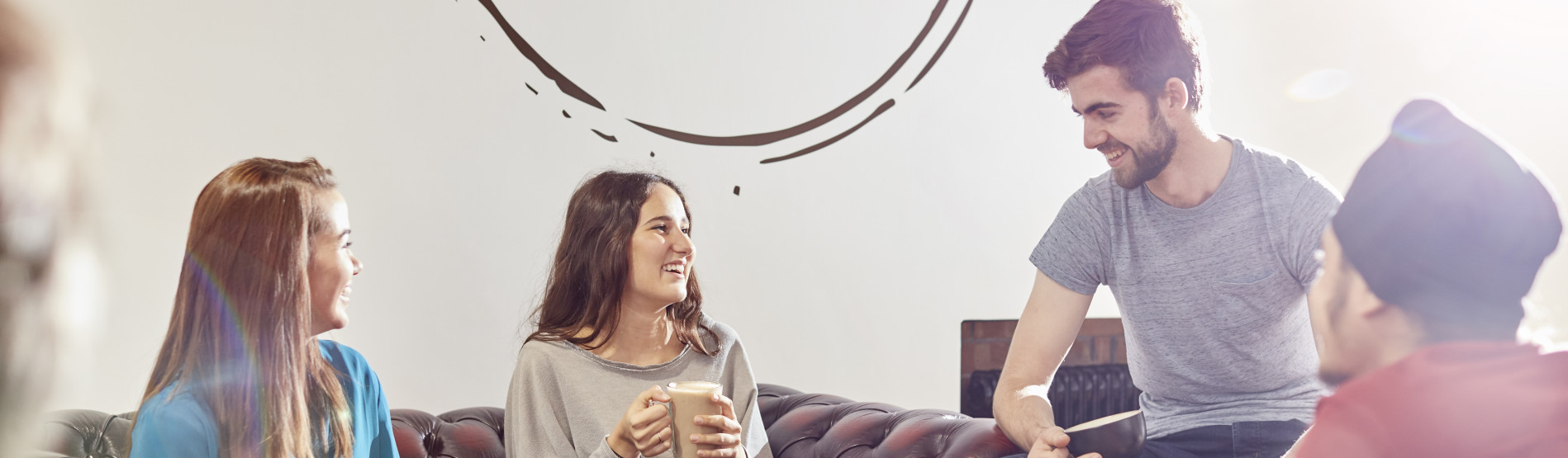 Three students having coffee in Fulton Coffee