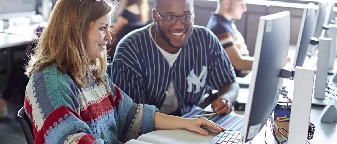 Two students at a pc