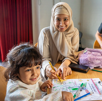 Mother and daughter creating