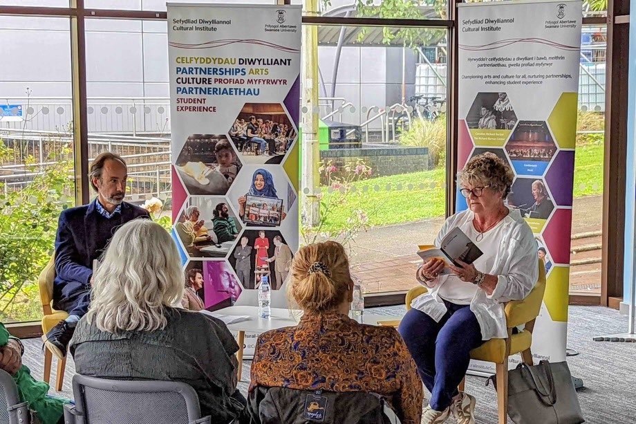 Carolyn Lewis reading from her book in front of audience members