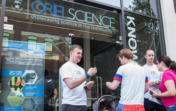 Oriel Science staff greeting customers outside the gallery