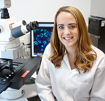 Student with microscope