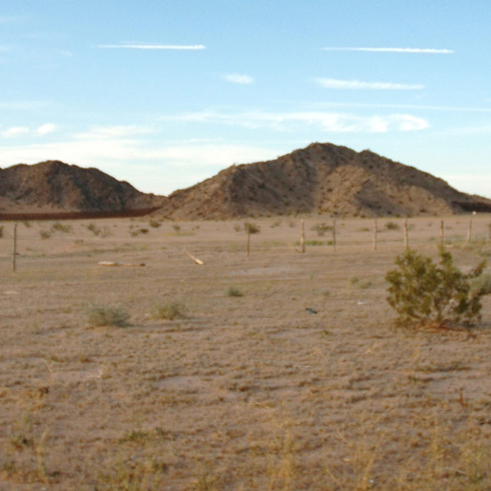 Image of a desert and tiny hills 