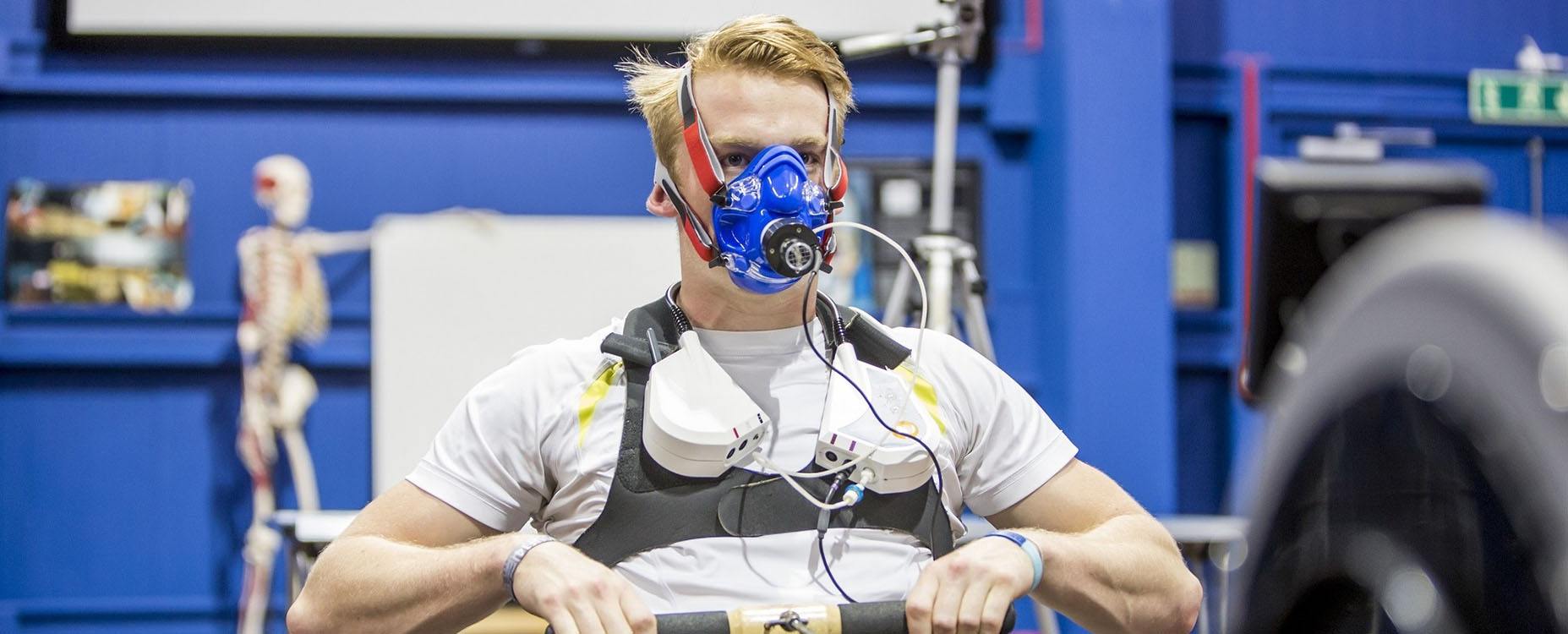 Sport and Exercise Science student using equipment