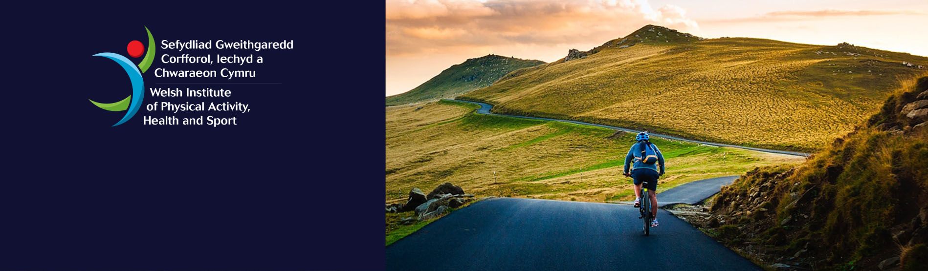 cyclist in welsh mountains