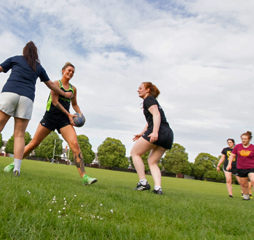 Girls playing football