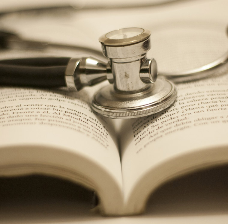 Stethoscope and book