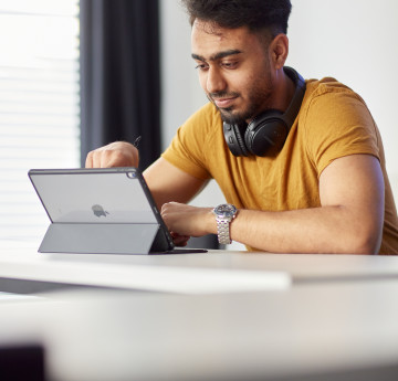 Male student with laptop