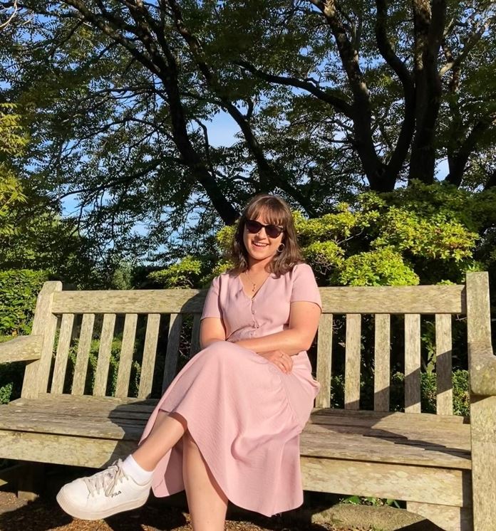 Student sitting on bench