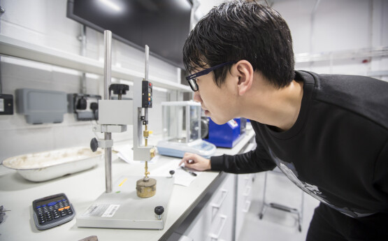 Student in a geo mechanics lab 