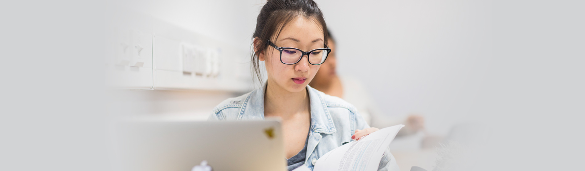 A student working on a laptop