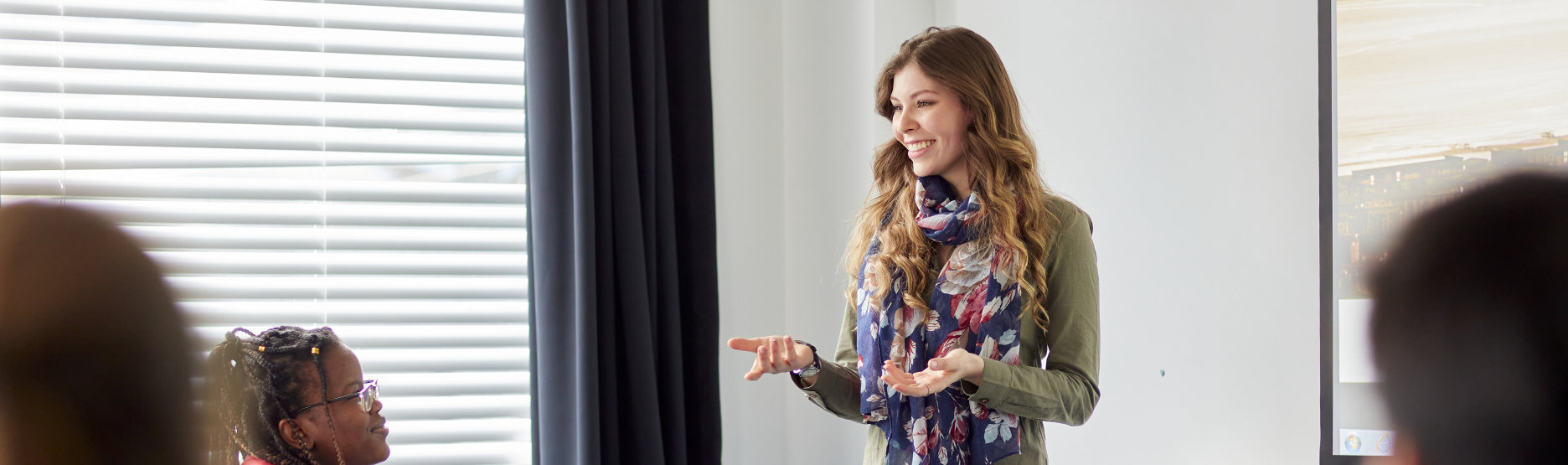 Woman presenting in a meeting