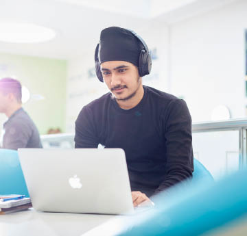 student working on a laptop