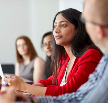 students in a meeting