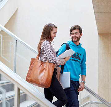 students walking down stairs