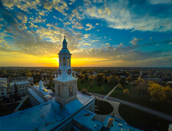 A clock tower on the campus with beautiful views across the horizon