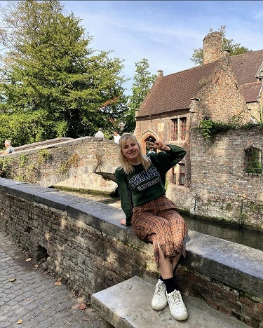 Girl sat on bridge