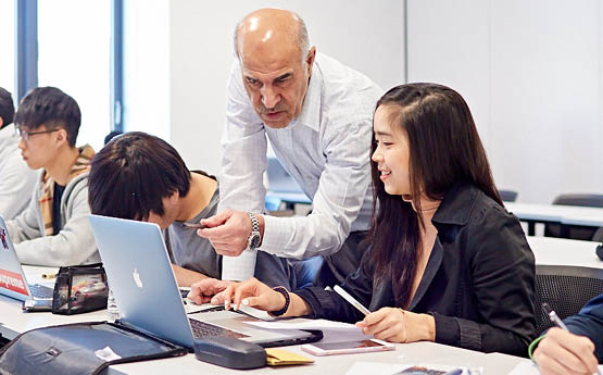 lecturer helping a student