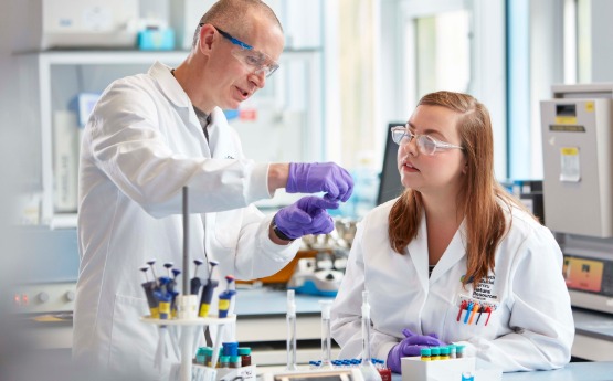 two people in lab