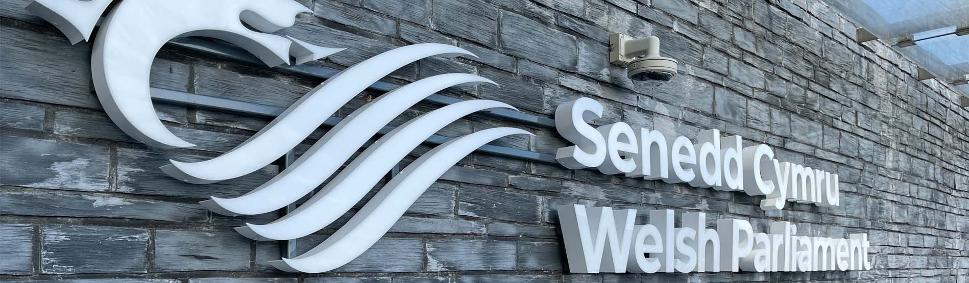 The Senedd branding on the Senedd Building in Cardiff