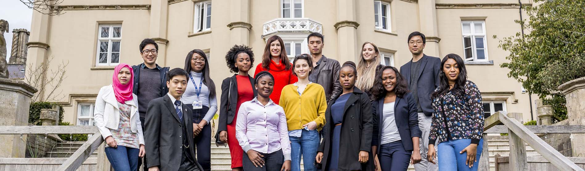 a group of students on the steps at the Singleton Abbey