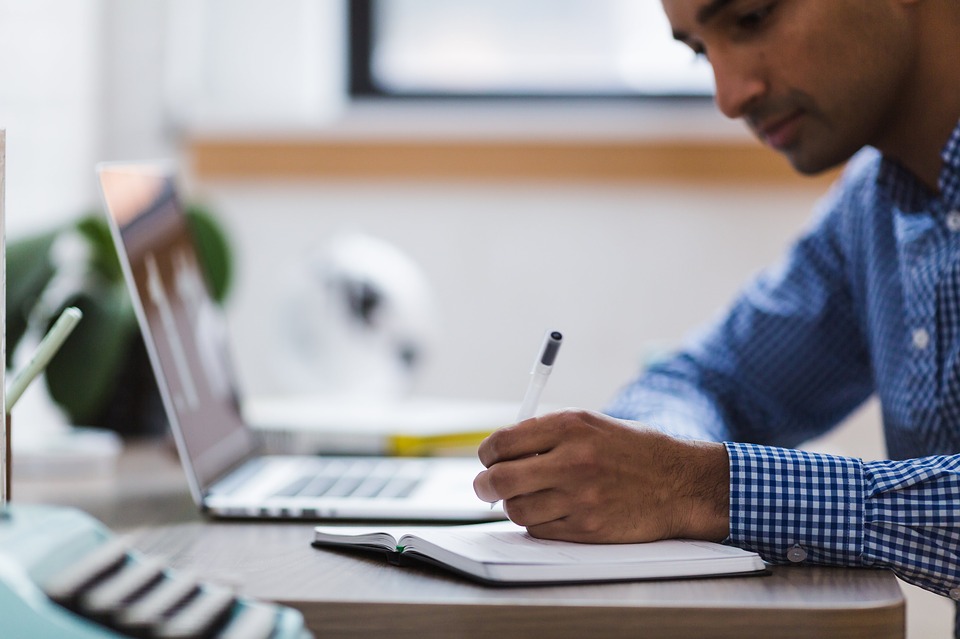 a researcher working at a laptop