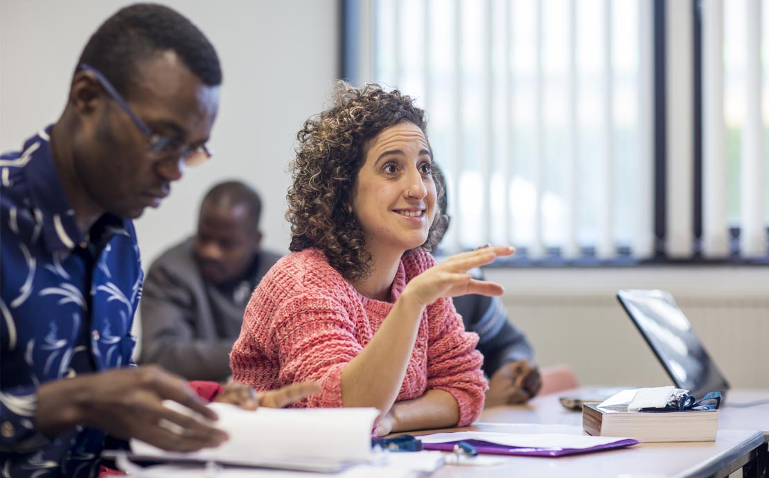 a student asking a question in a lecture