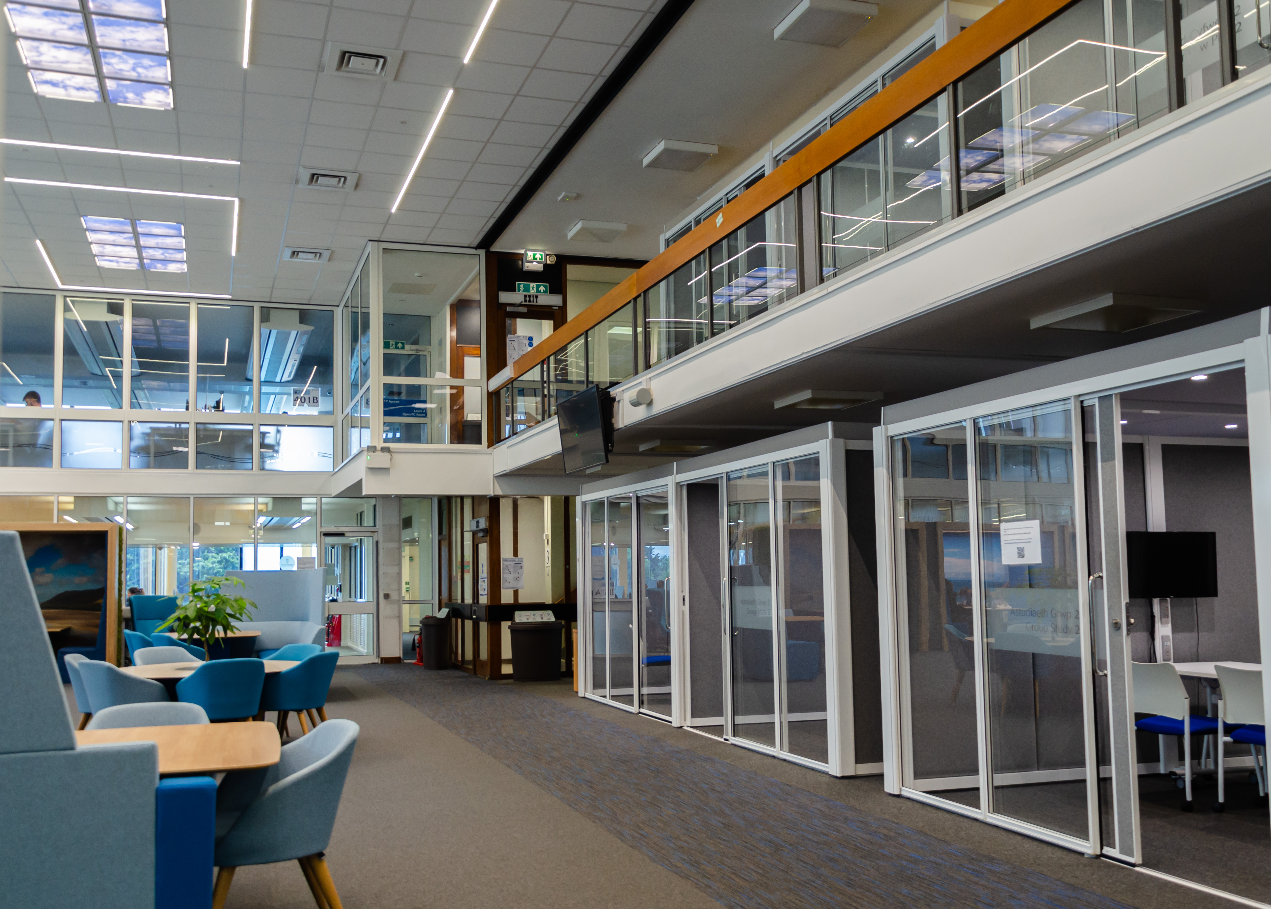 Study Hall to left and Glass fronted study pods to right