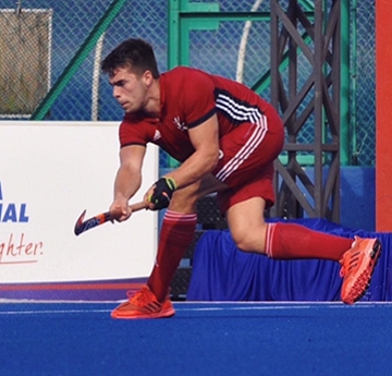 Sport Swansea Scholar Ioan Wall playing hockey