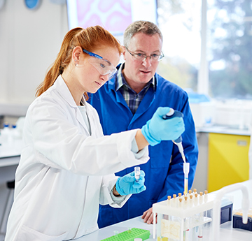 Student and lecturer in lab