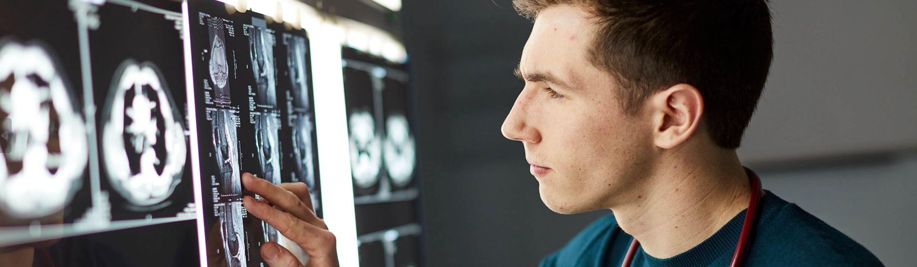 medical student studying xray screen