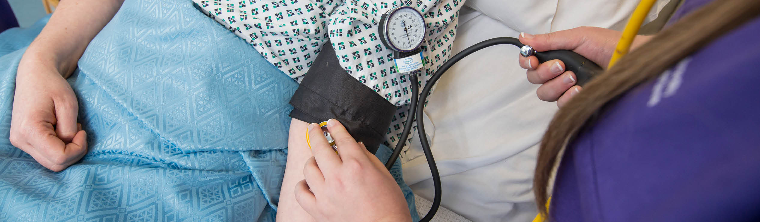 Blood pressure cuff on patients arm