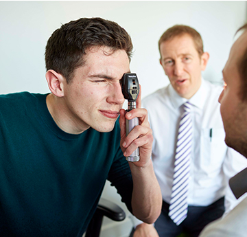 Student examining patient 