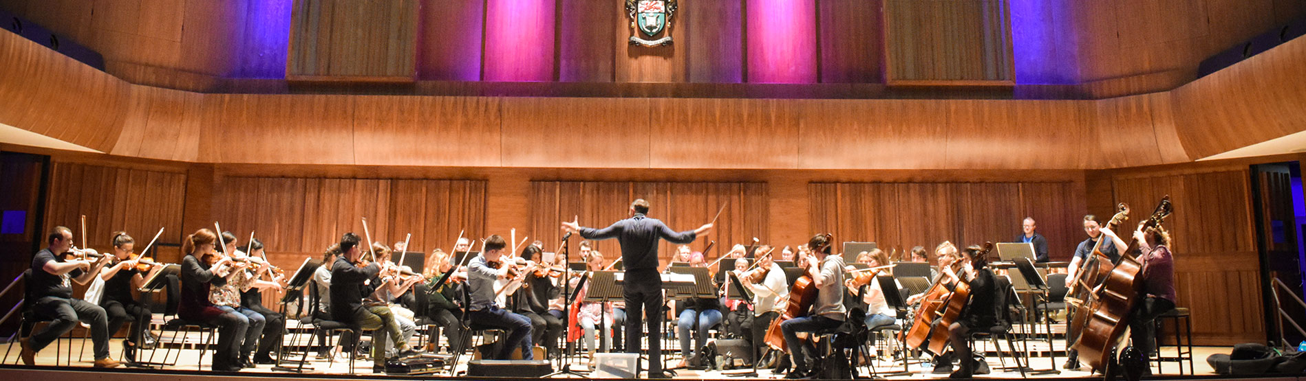 Orchestra on stage in the Great Hall