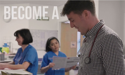 Doctor at Nurses station with nurse